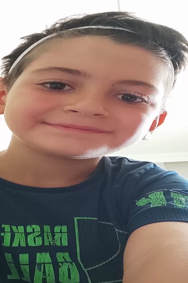 27457